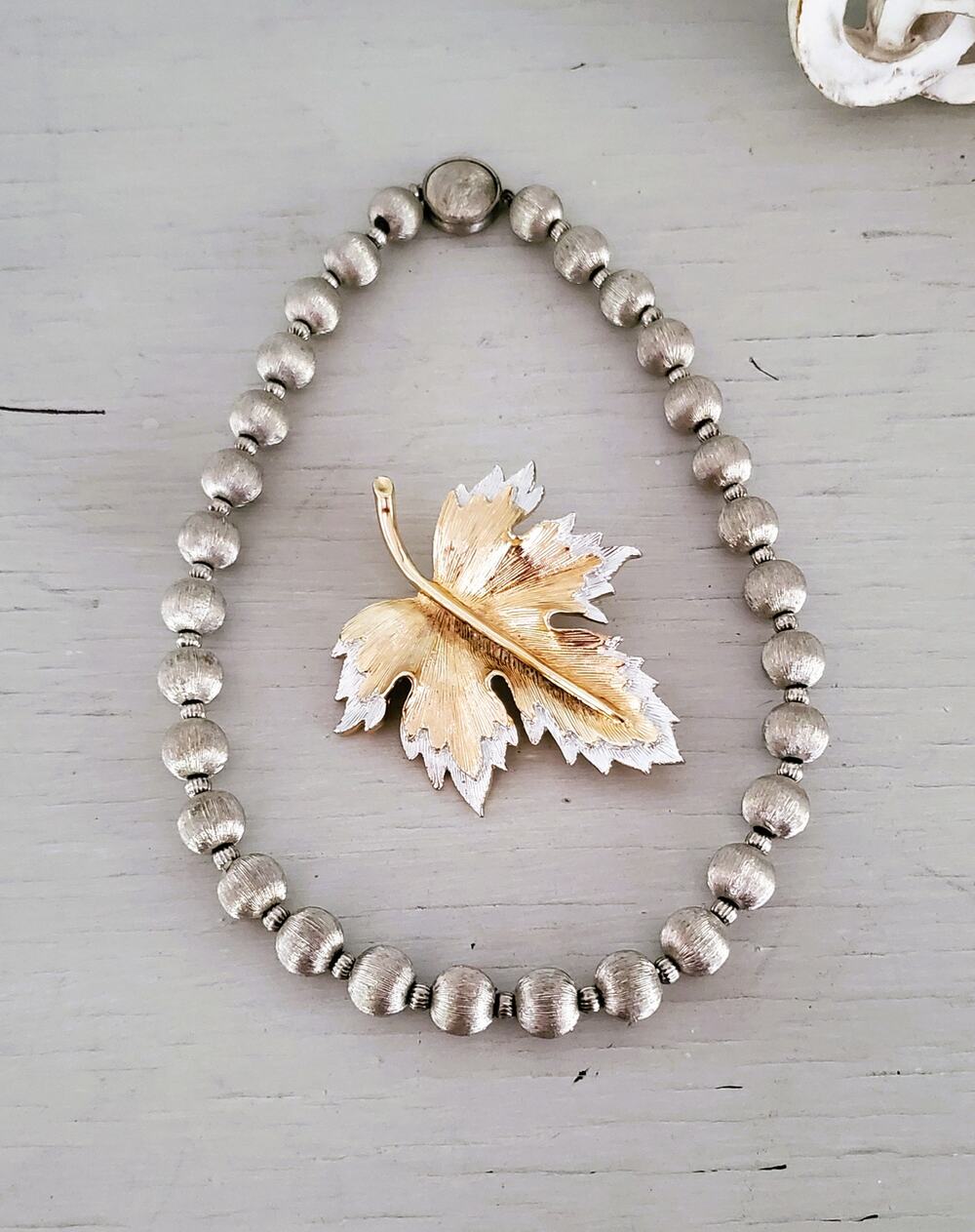 Vintage Silver Metallic Beaded Necklace with Sarah Coventry Maple Leaf Brooch